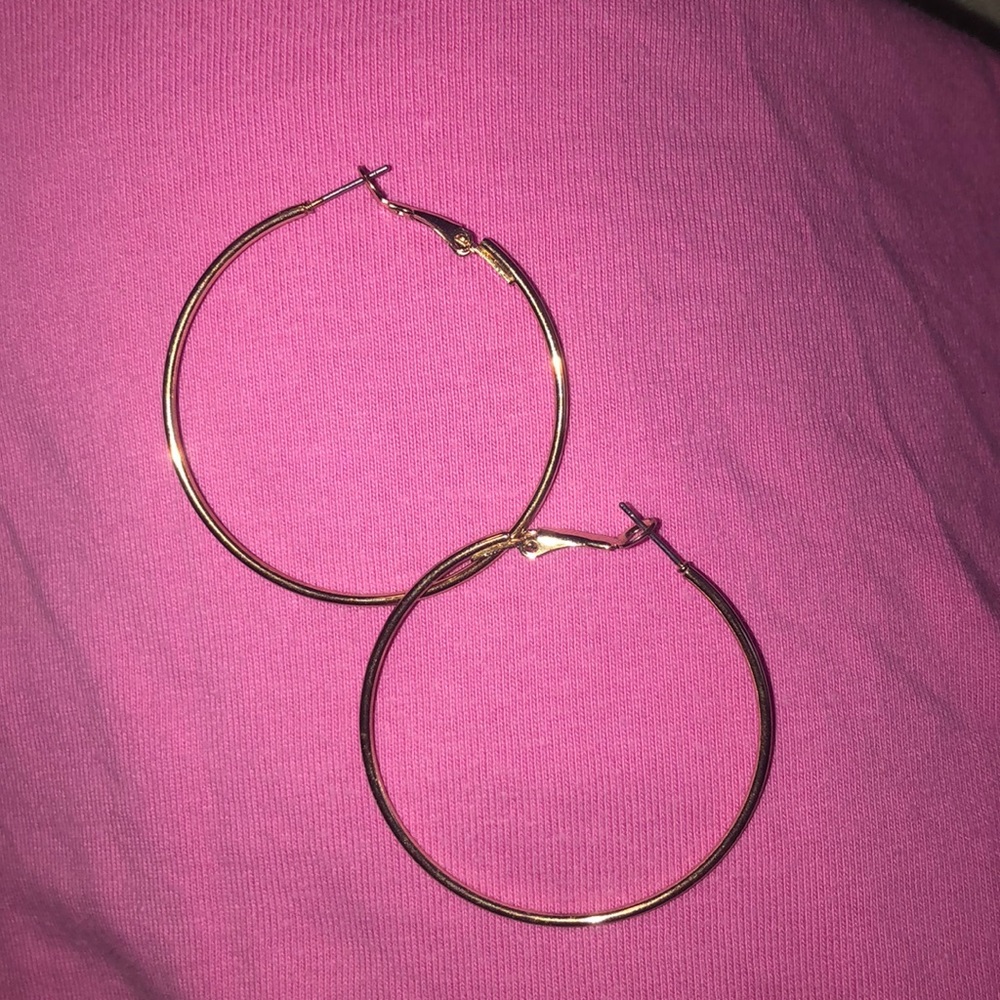 New never been worn gold earrings